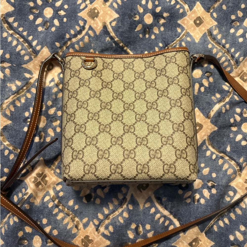 Gucci GG Emblem nano bucket bag